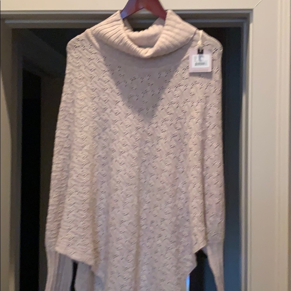 Woman’s one size fits all sweater/poncho